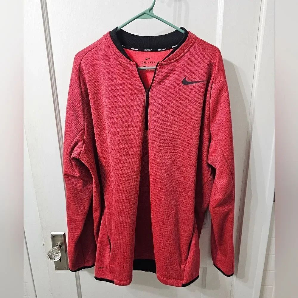 Nike golf 1/4 zip pullover over. Salmon color with black. XXL, excellent condit